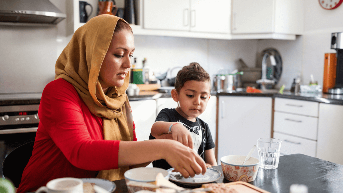 Members of a family in Turkish cooking together