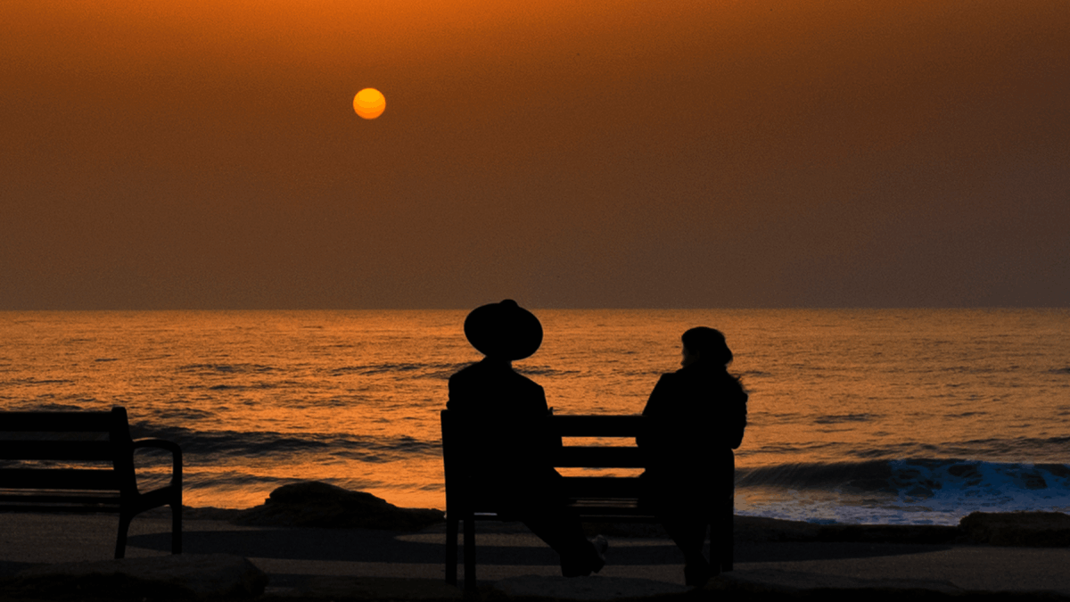 orthodox jews silhoutted against the sunset by the water who speaks yiddish